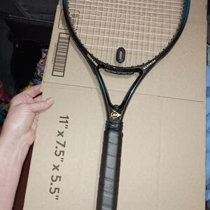 Dynamic Black and Blue Tennis Racket